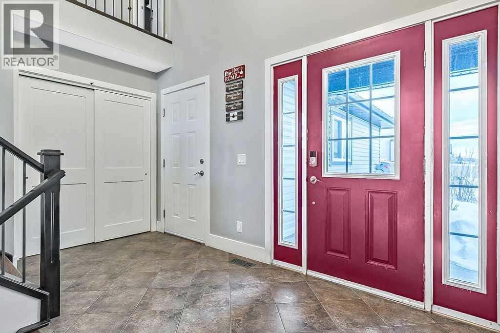 605 Sunrise Close — Diamond Valley, Alberta - Photo 3 of 50