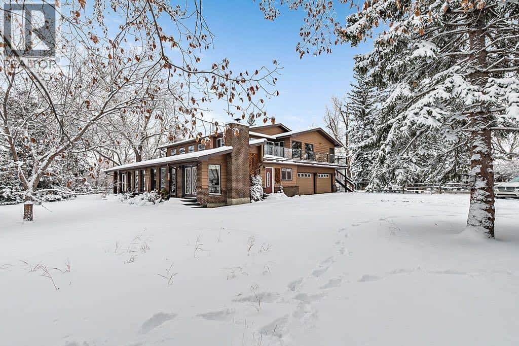 258100 16 Street E — De Winton, Alberta - Photo 2 of 50