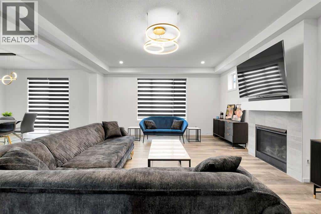 4168 Windsong Boulevard SW — Airdrie, Alberta - Photo 2 of 48