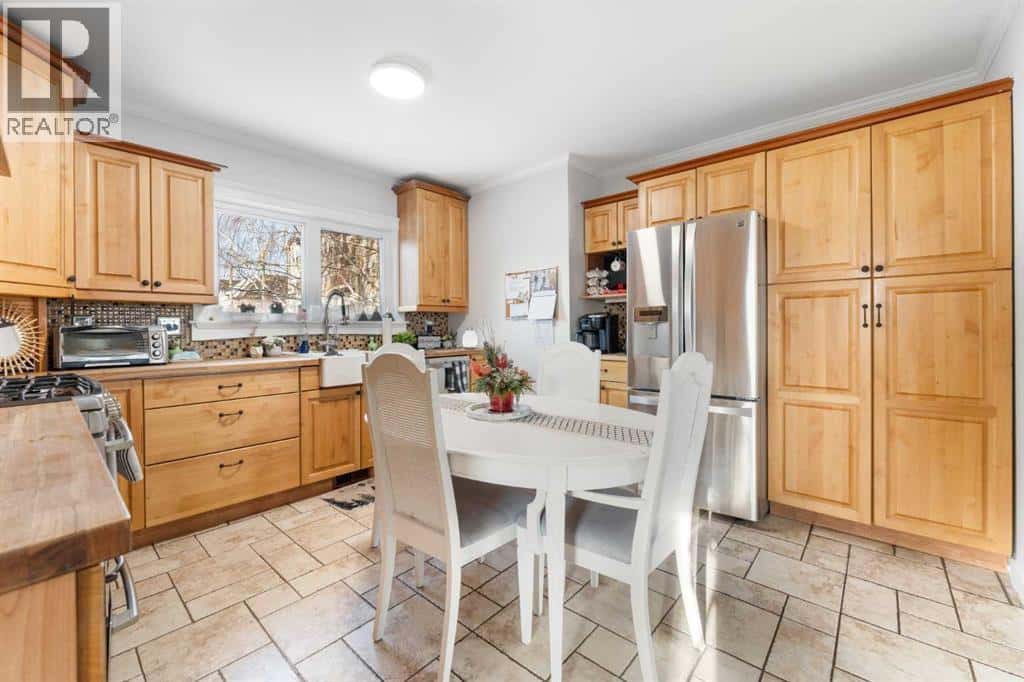 313 Ross Avenue — Cochrane, Alberta - Photo 5 of 28