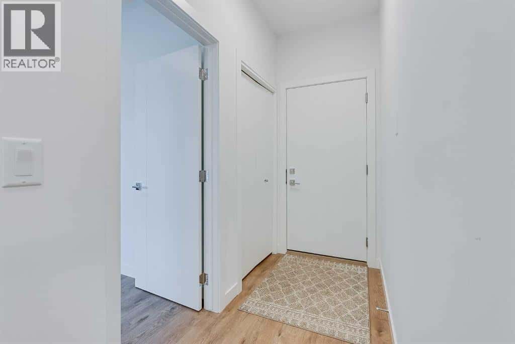 302, 6 Merganser Drive — Chestermere, Alberta - Photo 3 of 38