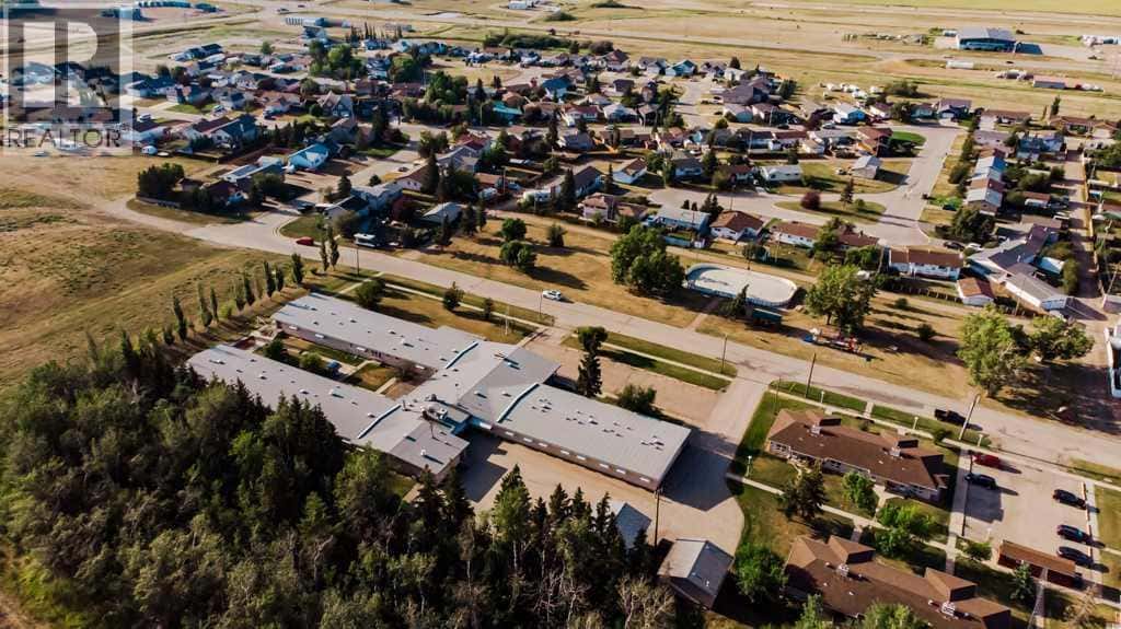 5230 44 Avenue — Spirit River, Alberta - Photo 2 of 50