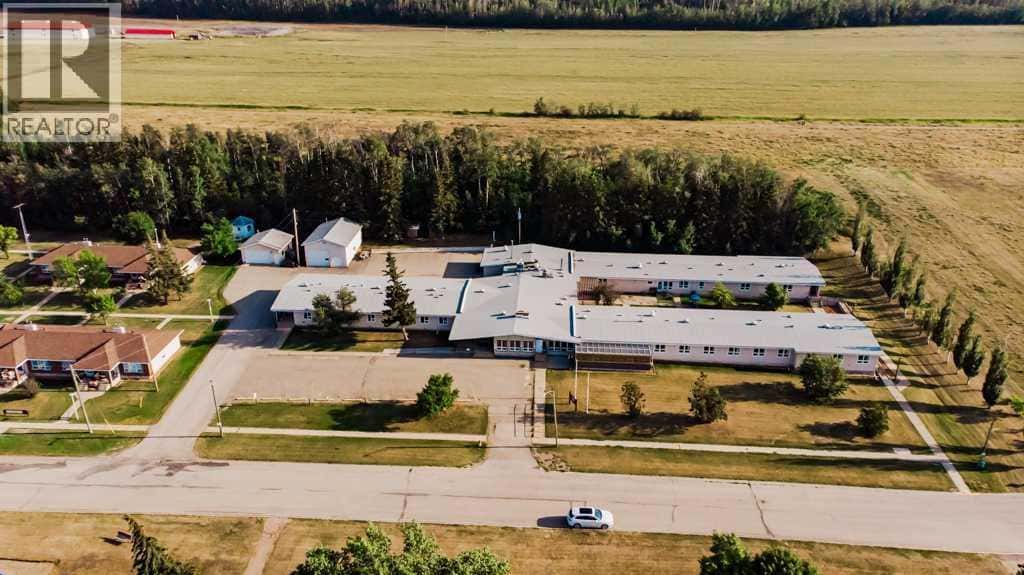 5230 44 Avenue — Spirit River, Alberta - Photo 5 of 50