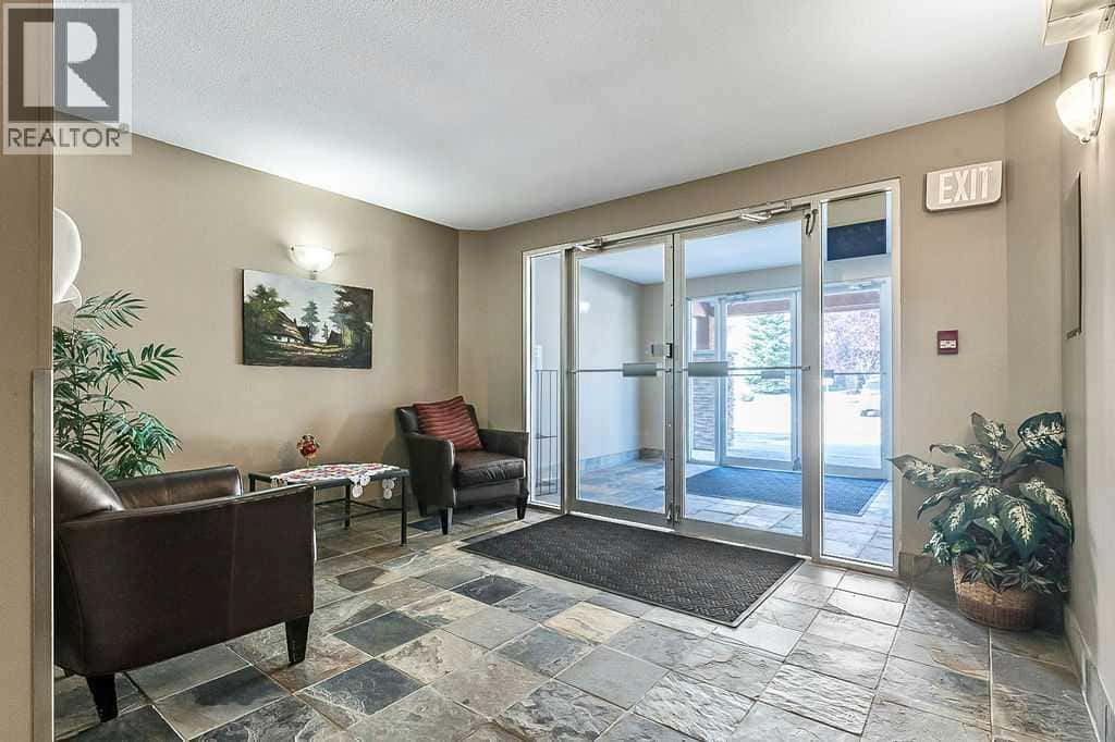 2105, 92 Crystal Shores Road — Okotoks, Alberta - Photo 2 of 44