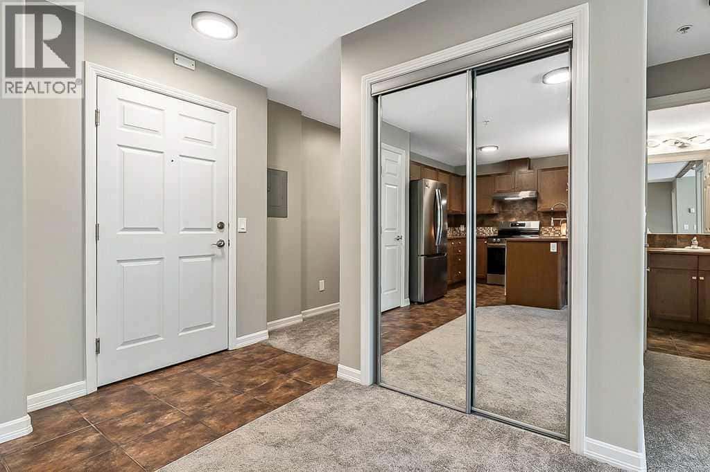 2105, 92 Crystal Shores Road — Okotoks, Alberta - Photo 3 of 44