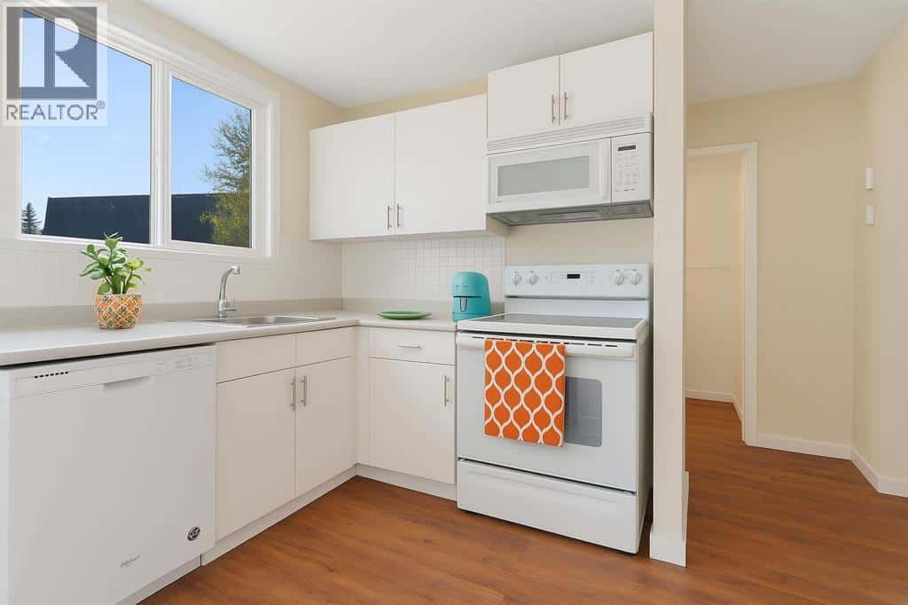 32, 80 Galbraith Drive SW — Calgary, Alberta - Photo 3 of 37