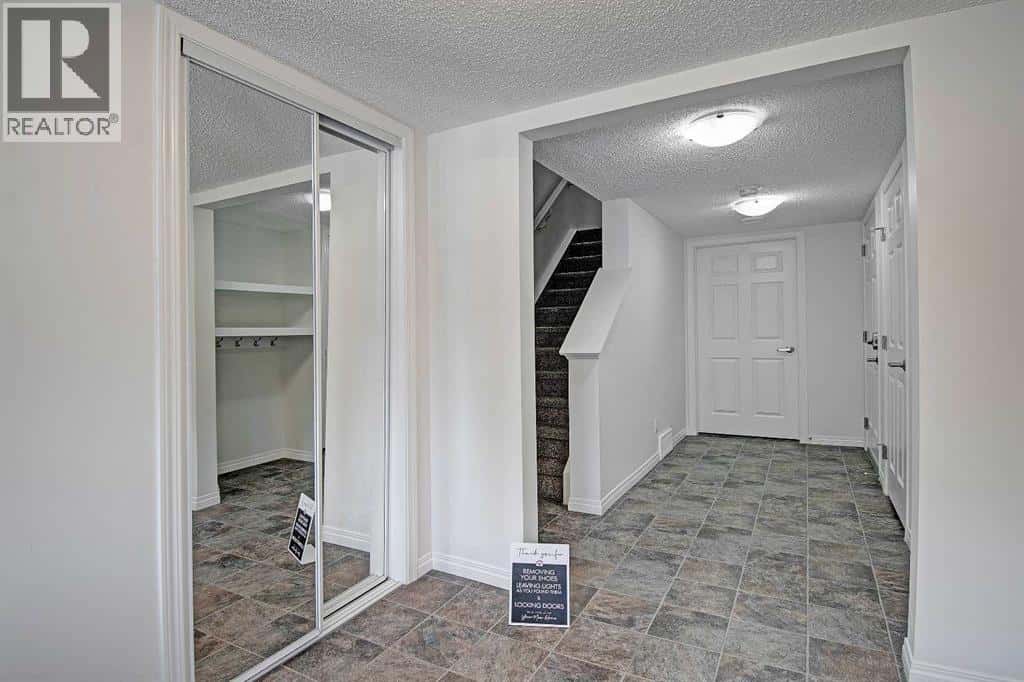 221 Hillcrest Gardens SW — Airdrie, Alberta - Photo 3 of 47