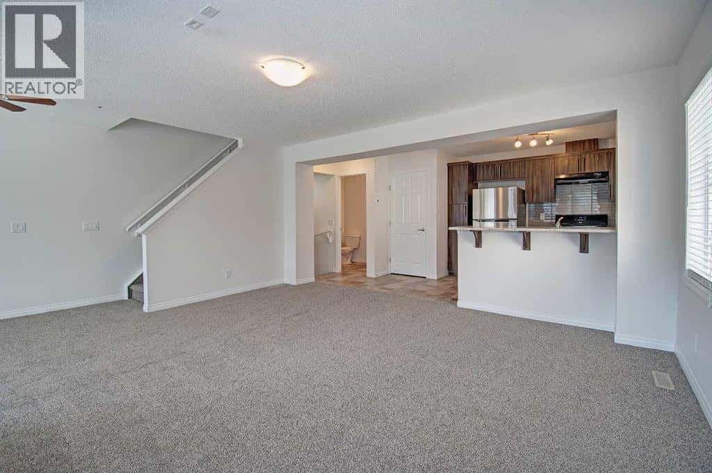 221 Hillcrest Gardens SW — Airdrie, Alberta - Photo 5 of 47