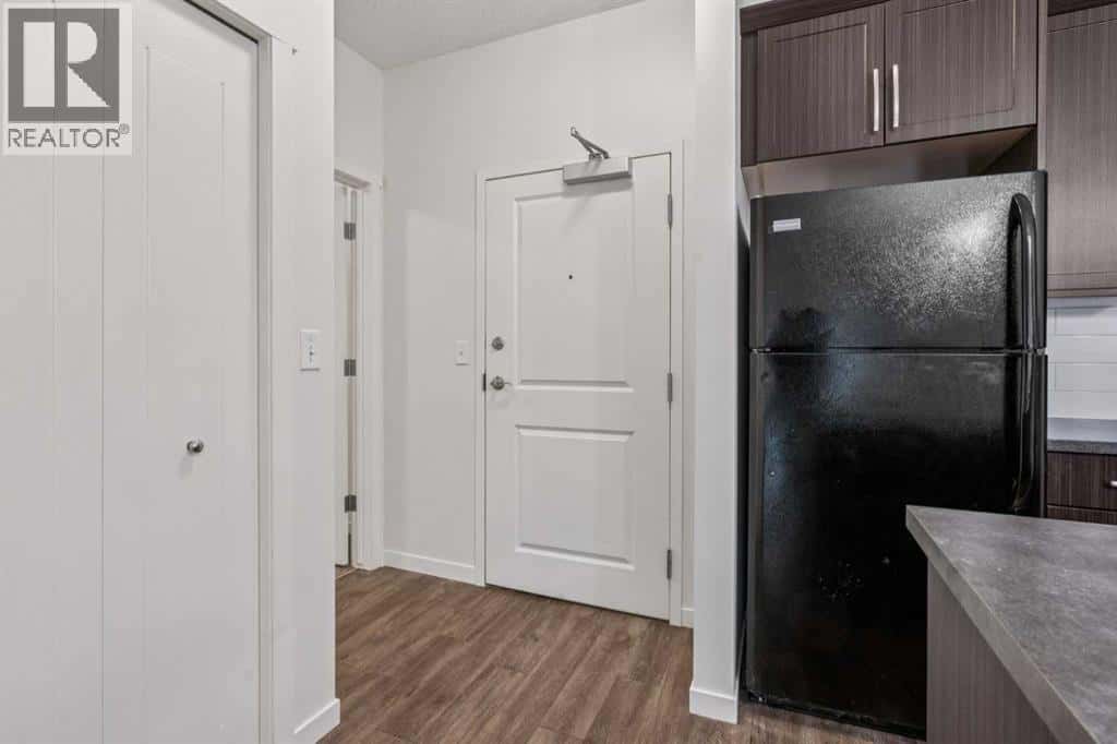 9211, 101 Sunset Drive — Cochrane, Alberta - Photo 5 of 19