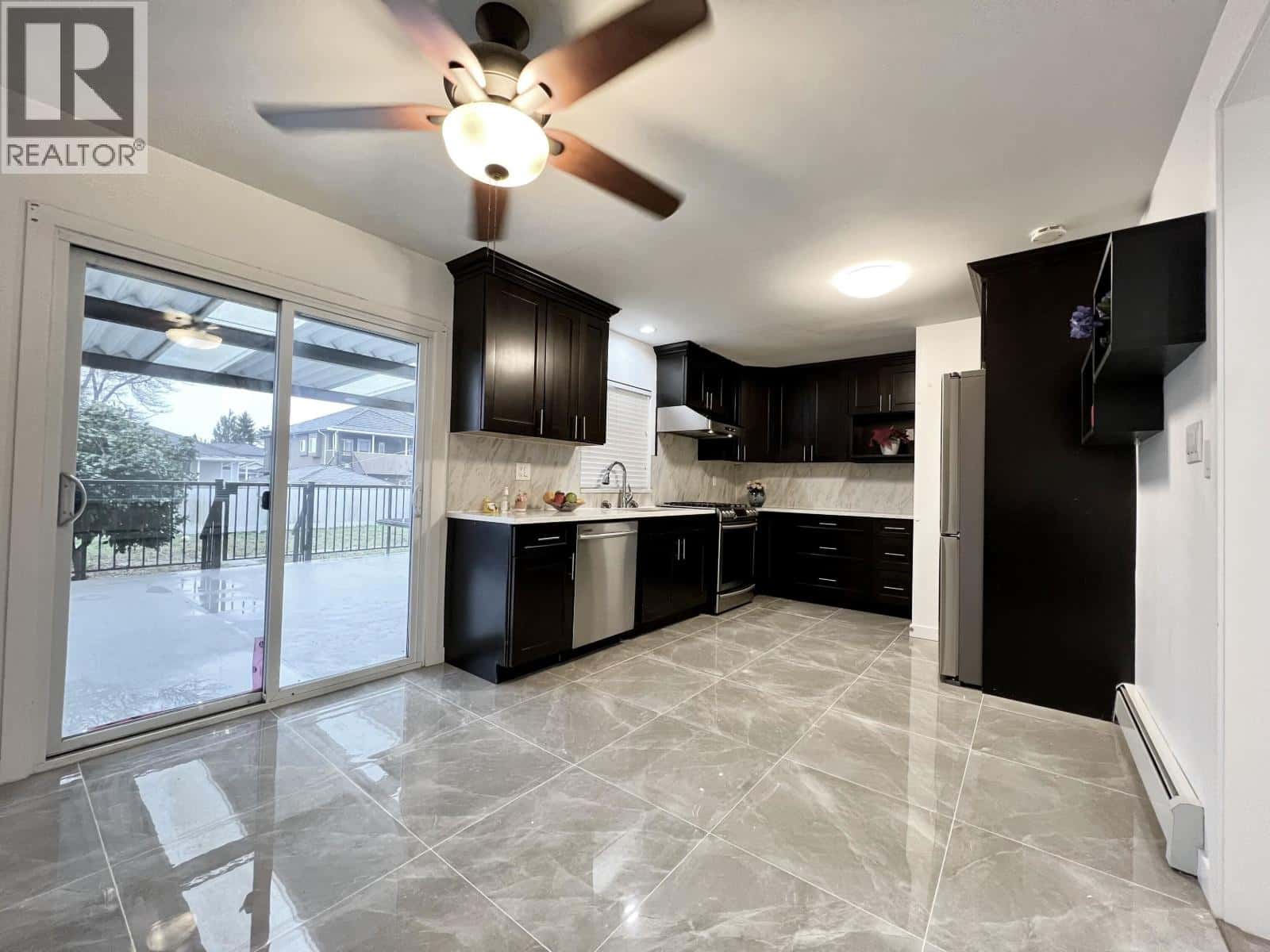 7768 18TH AVENUE — Burnaby, British Columbia - Photo 4 of 28