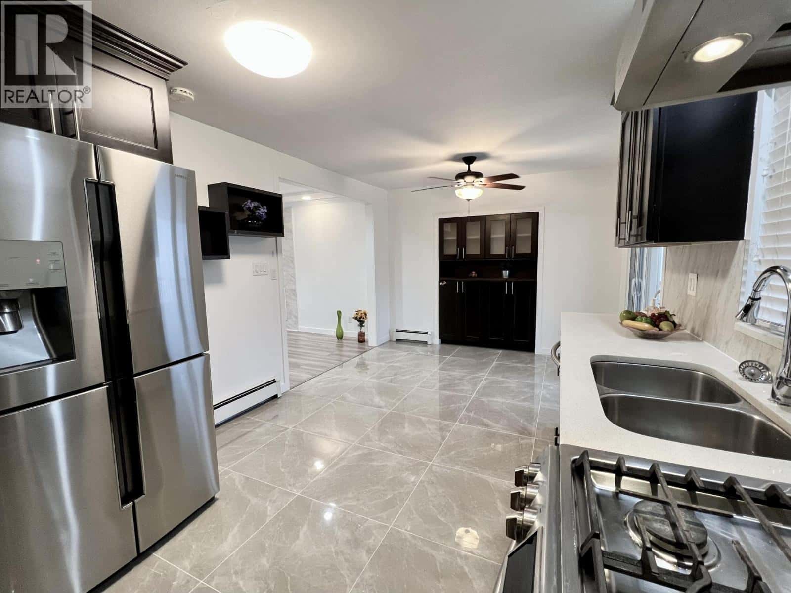 7768 18TH AVENUE — Burnaby, British Columbia - Photo 5 of 28