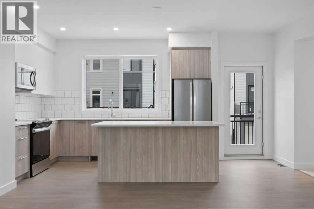 #210, 857 Belmont Drive SW — Calgary, Alberta - Photo 4 of 22