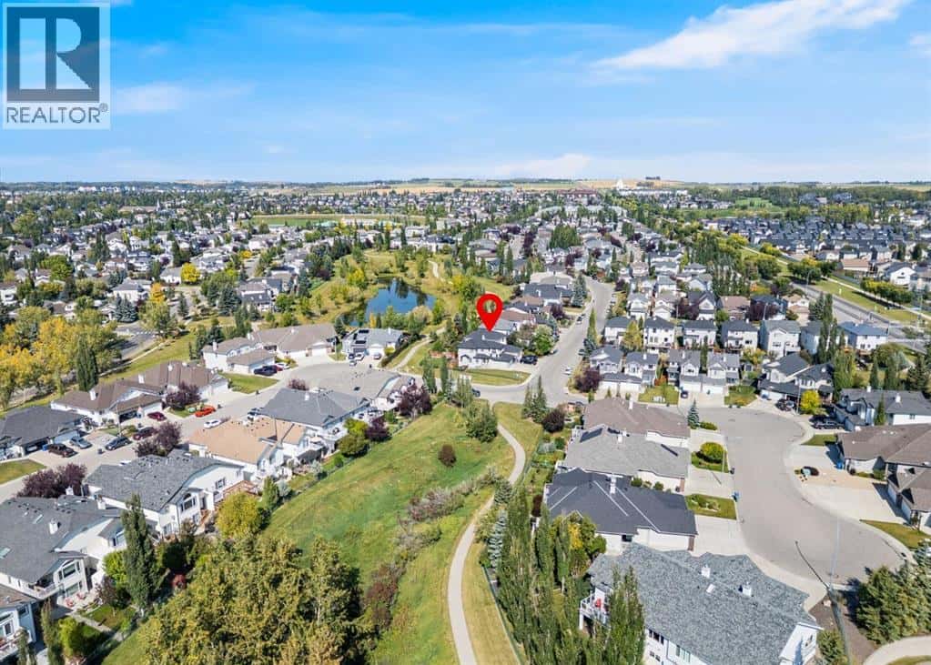 201 Crystalridge Rise — Okotoks, Alberta - Photo 2 of 50