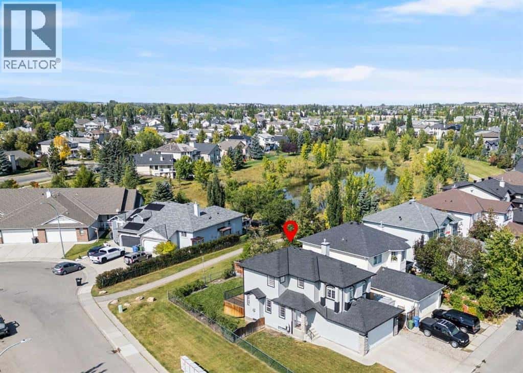 201 Crystalridge Rise — Okotoks, Alberta - Photo 3 of 50