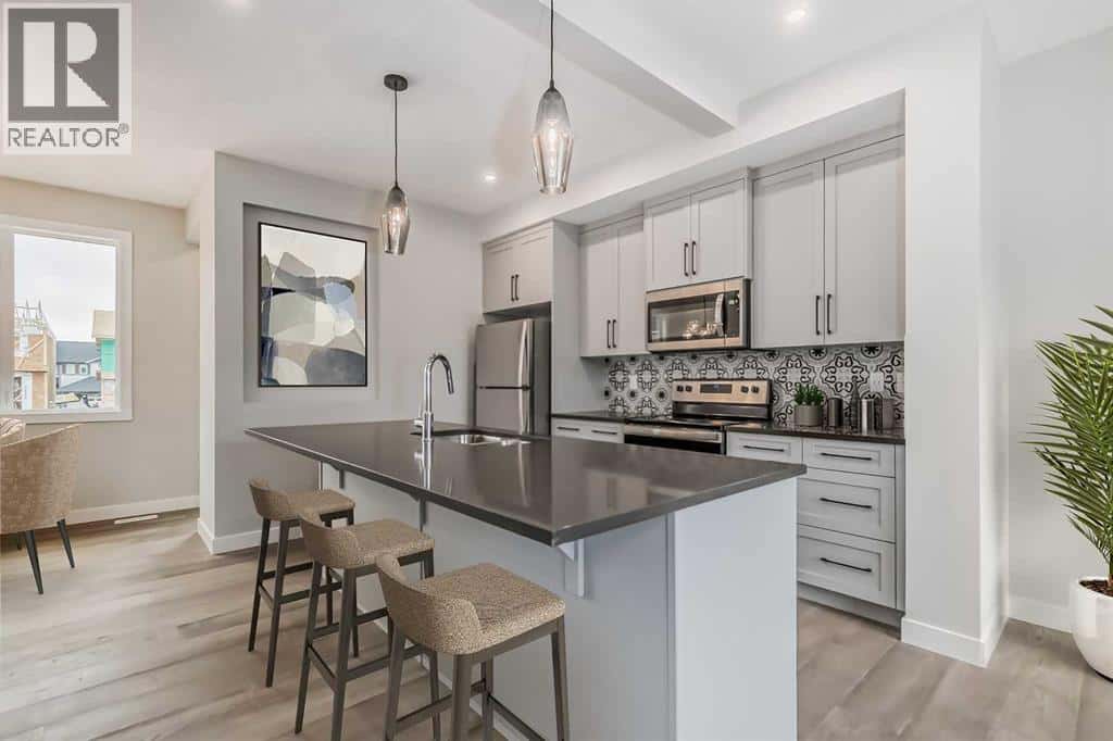 211 Waterford Heights — Chestermere - Photo 2 of 4