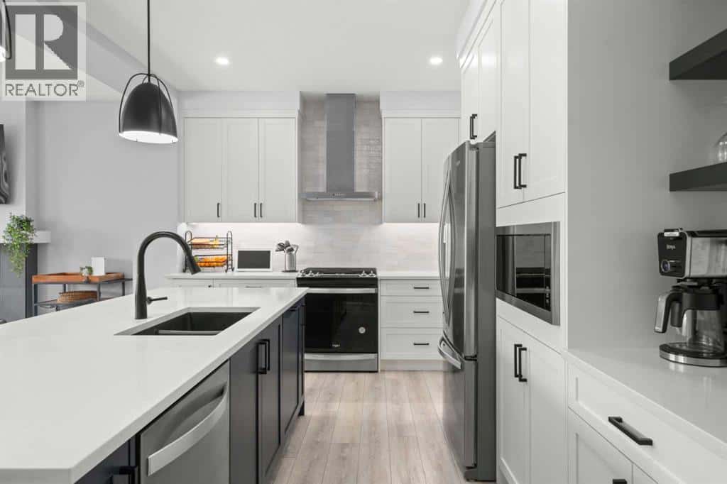 77 Sage Hill Crescent NW — Calgary, Alberta - Photo 4 of 38