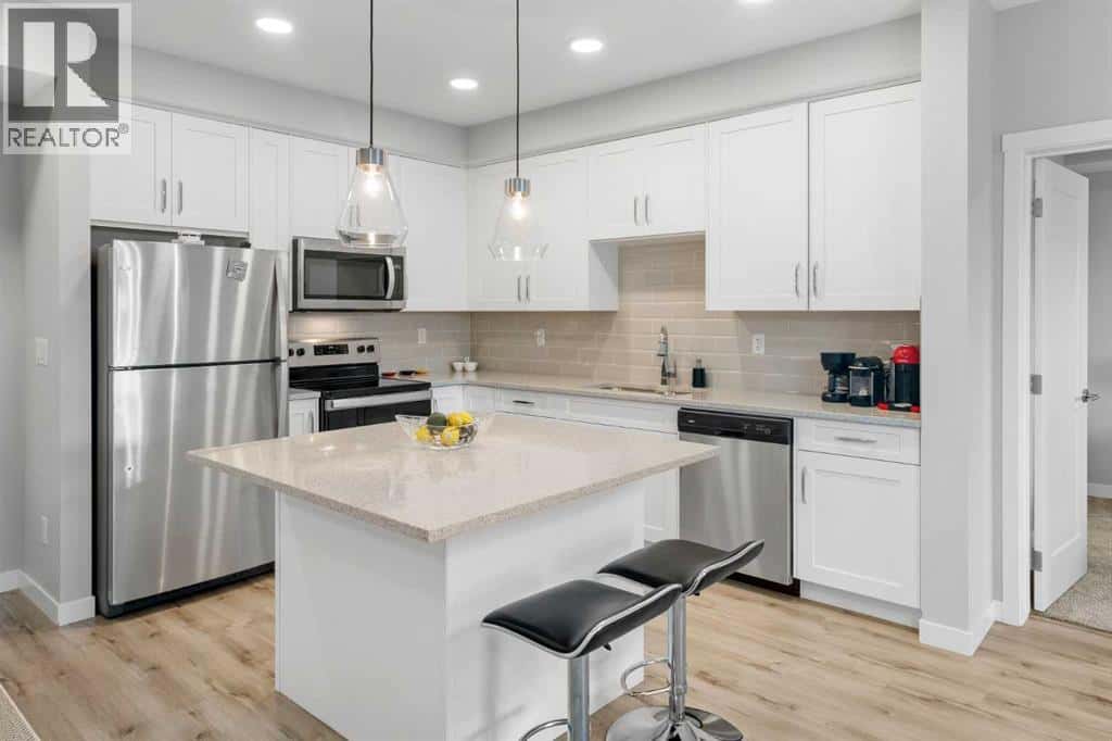 205, 150 Shawnee Square SW — Calgary, Alberta - Photo 2 of 23