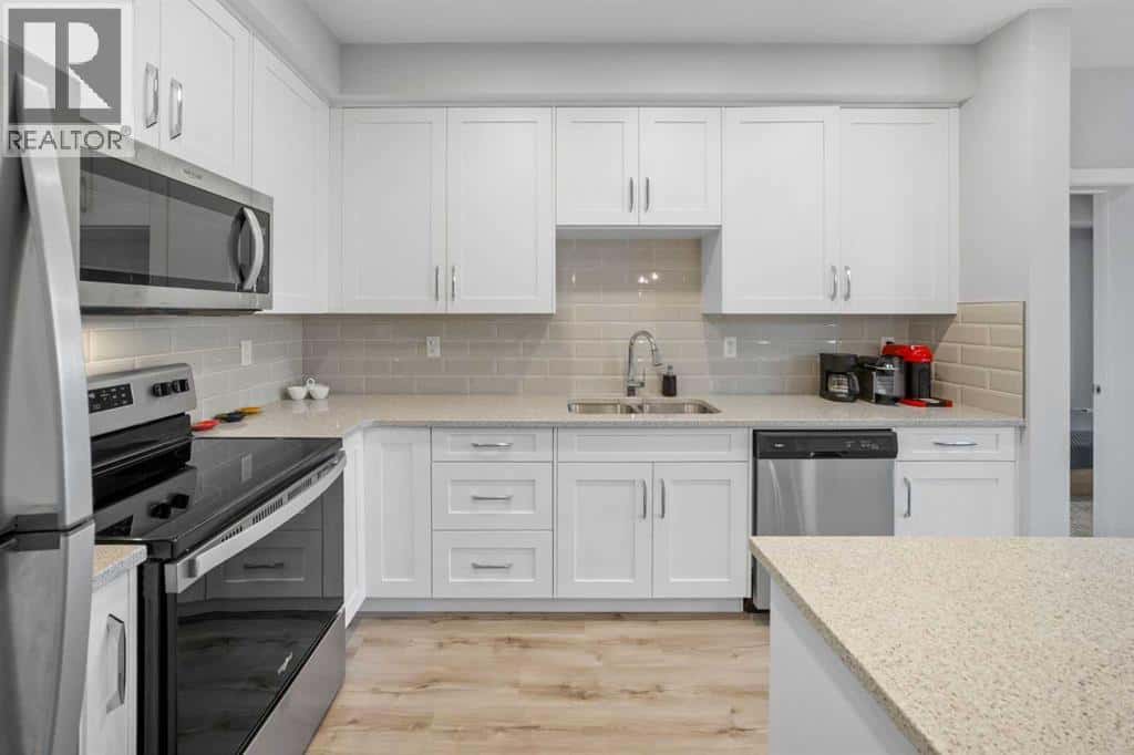 205, 150 Shawnee Square SW — Calgary, Alberta - Photo 4 of 23