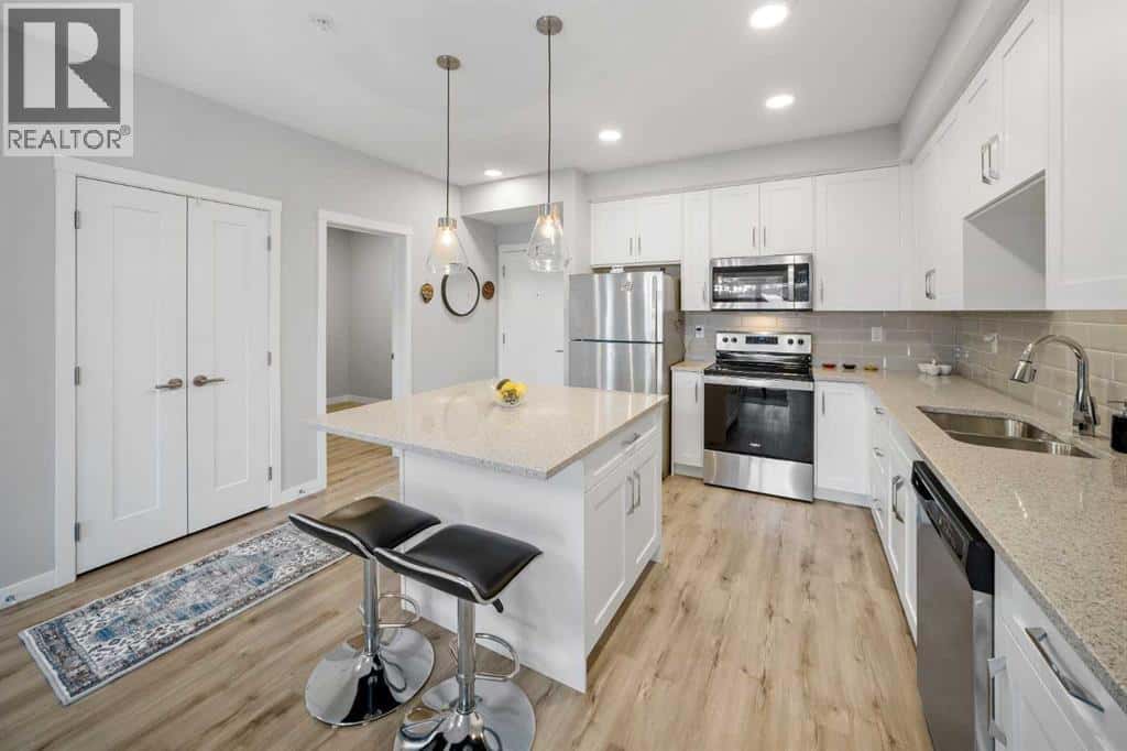 205, 150 Shawnee Square SW — Calgary, Alberta - Photo 5 of 23