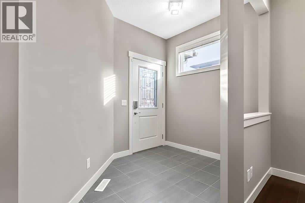 90 Mount Rae Heights — Okotoks, Alberta - Photo 2 of 50