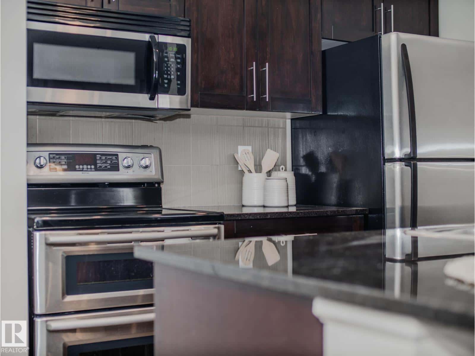 #211 11803 22 AV SW — Edmonton, Alberta - Photo 3 of 37