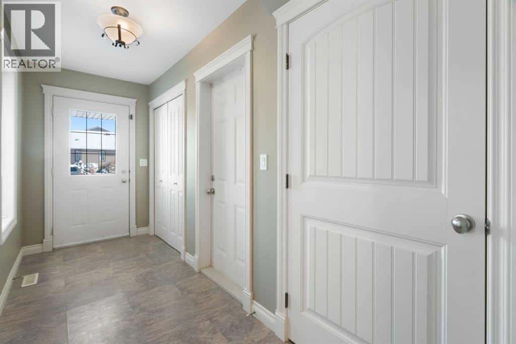 17 Deer Coulee Drive — Didsbury, Alberta - Photo 3 of 39