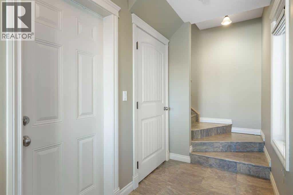 17 Deer Coulee Drive — Didsbury, Alberta - Photo 4 of 39