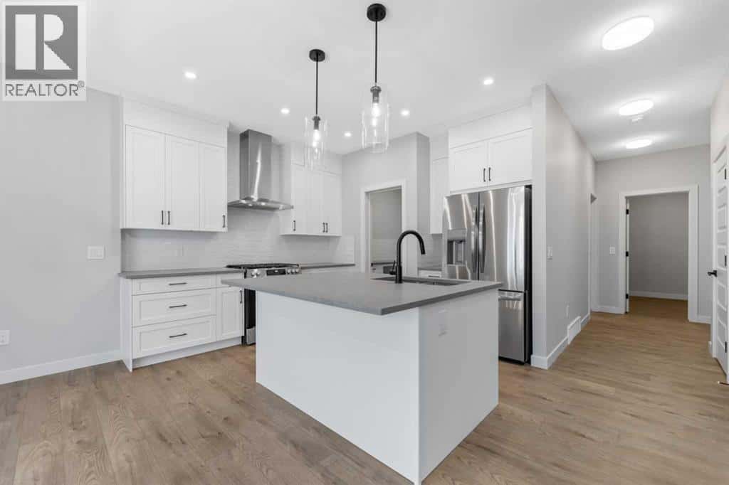 1067 Fowler Road SW — Airdrie, Alberta - Photo 4 of 29