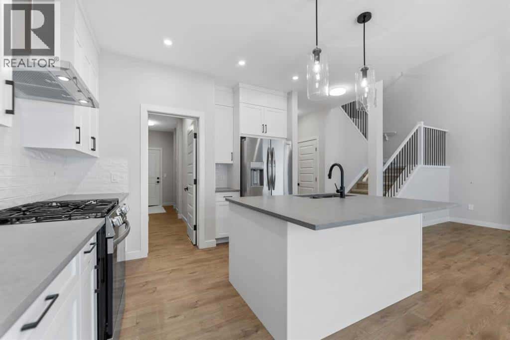 1067 Fowler Road SW — Airdrie, Alberta - Photo 5 of 29