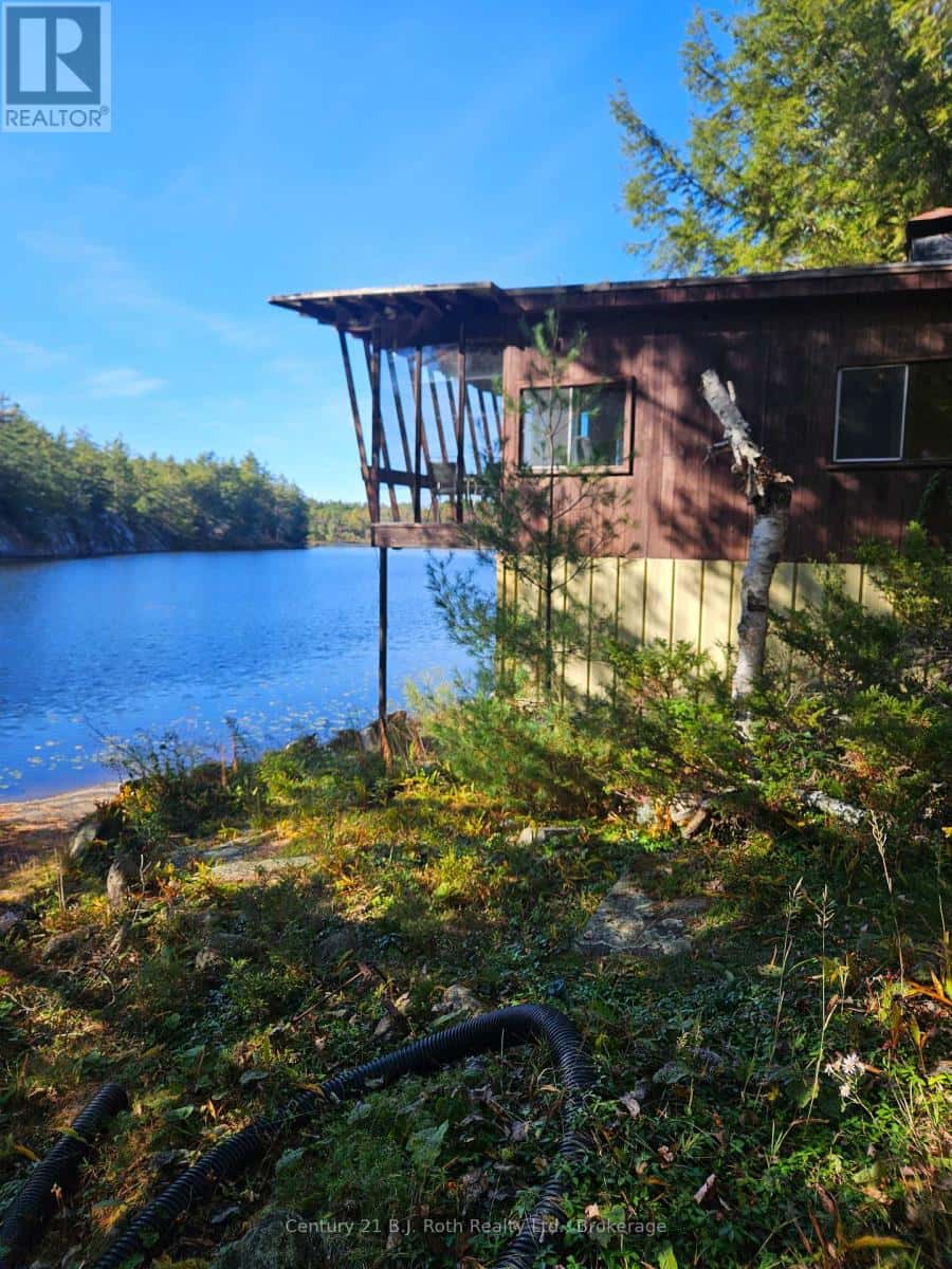 1112 SAM COOK ROAD — Gravenhurst (Ryde), Ontario - Photo 3 of 24