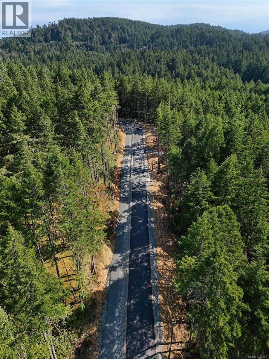 4595 BECKINGHAM Rd — Metchosin, British Columbia - Photo 4 of 5