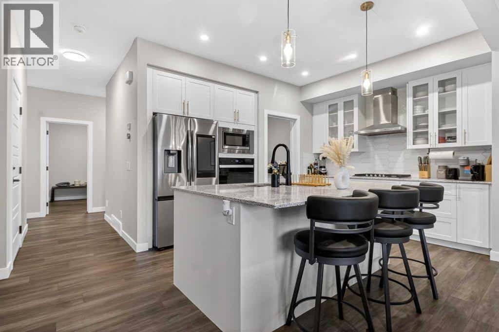 66 Belmont Manor SW — Calgary, Alberta - Photo 5 of 47