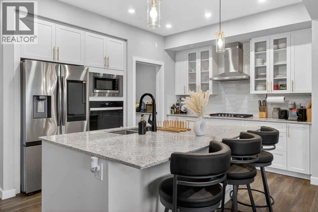 66 Belmont Manor SW — Calgary, Alberta - Photo 4 of 47