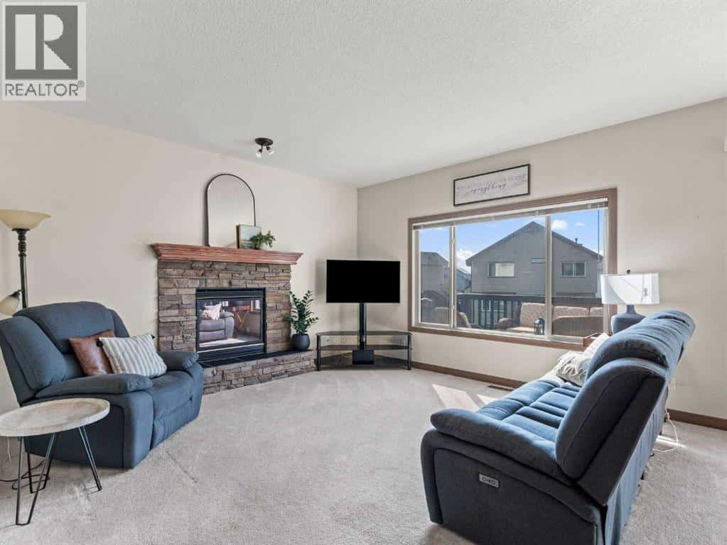 95 Crystal Shores Road — Okotoks, Alberta - Photo 5 of 40