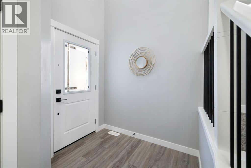 628 Edgefield Street — Strathmore, Alberta - Photo 2 of 42