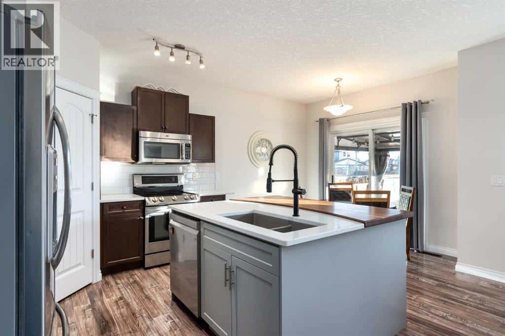 729 Hampton Hills Drive NE — High River, Alberta - Photo 4 of 41