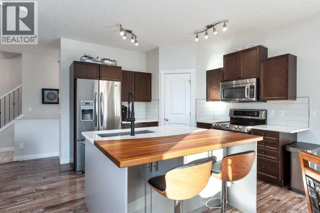 729 Hampton Hills Drive NE — High River, Alberta - Photo 5 of 41