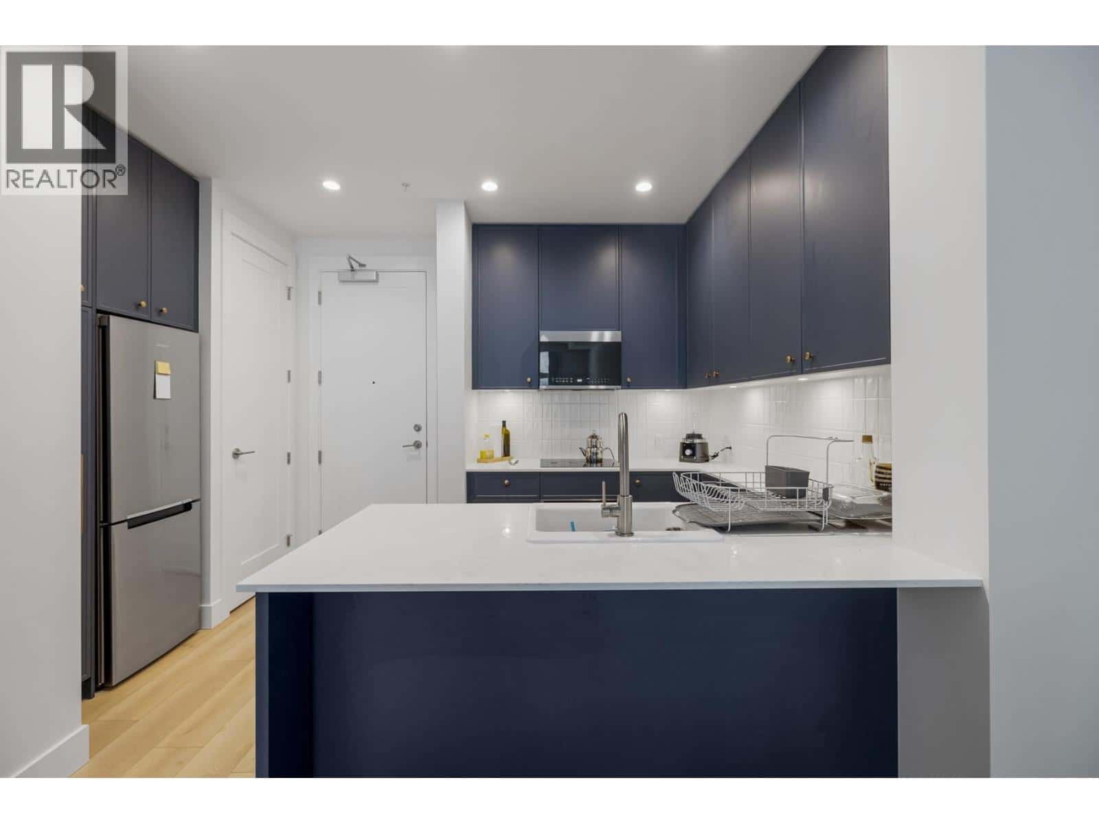 110 708 EDGAR AVENUE — Coquitlam, British Columbia - Photo 2 of 23