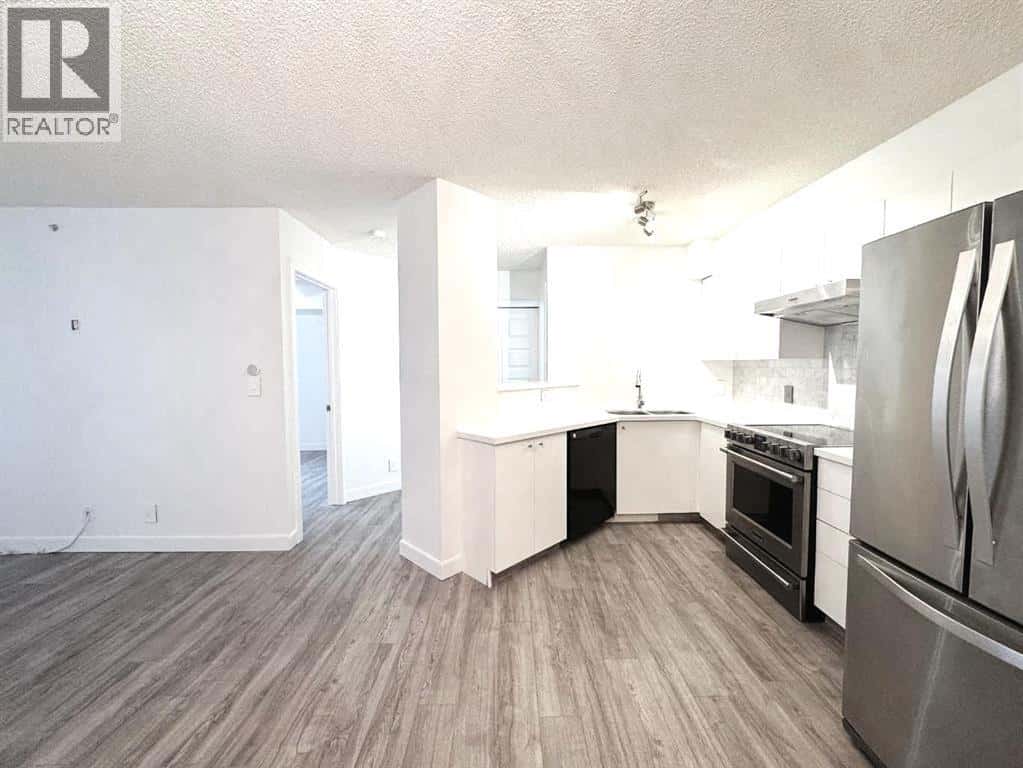 509, 1111 6 Avenue SW — Calgary, Alberta - Photo 5 of 26