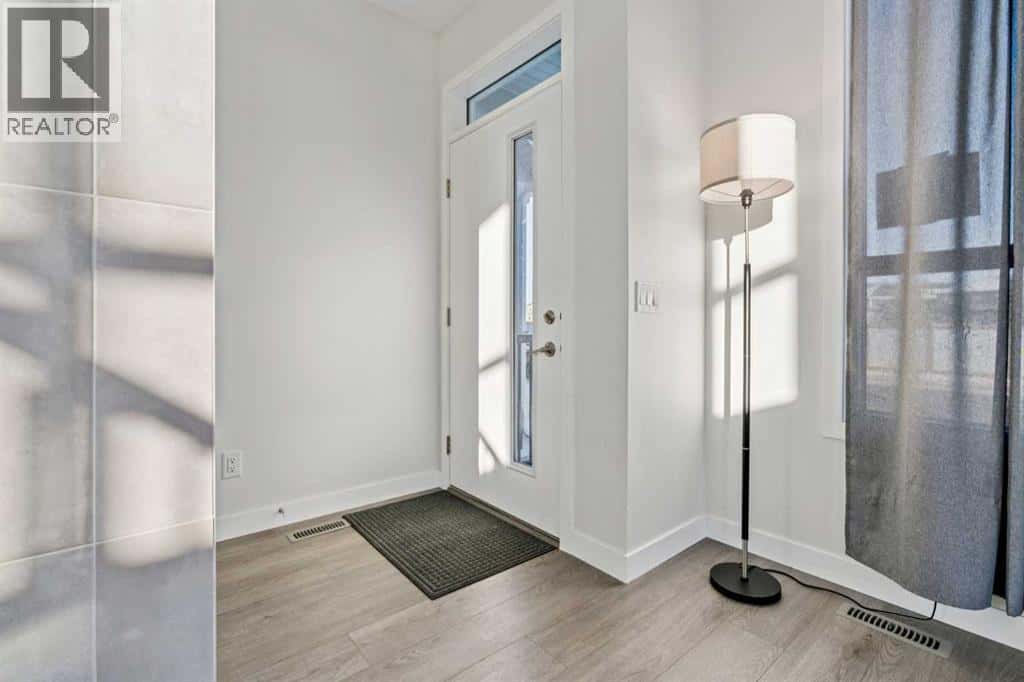 101 Lavender Manor SE — Calgary, Alberta - Photo 4 of 39