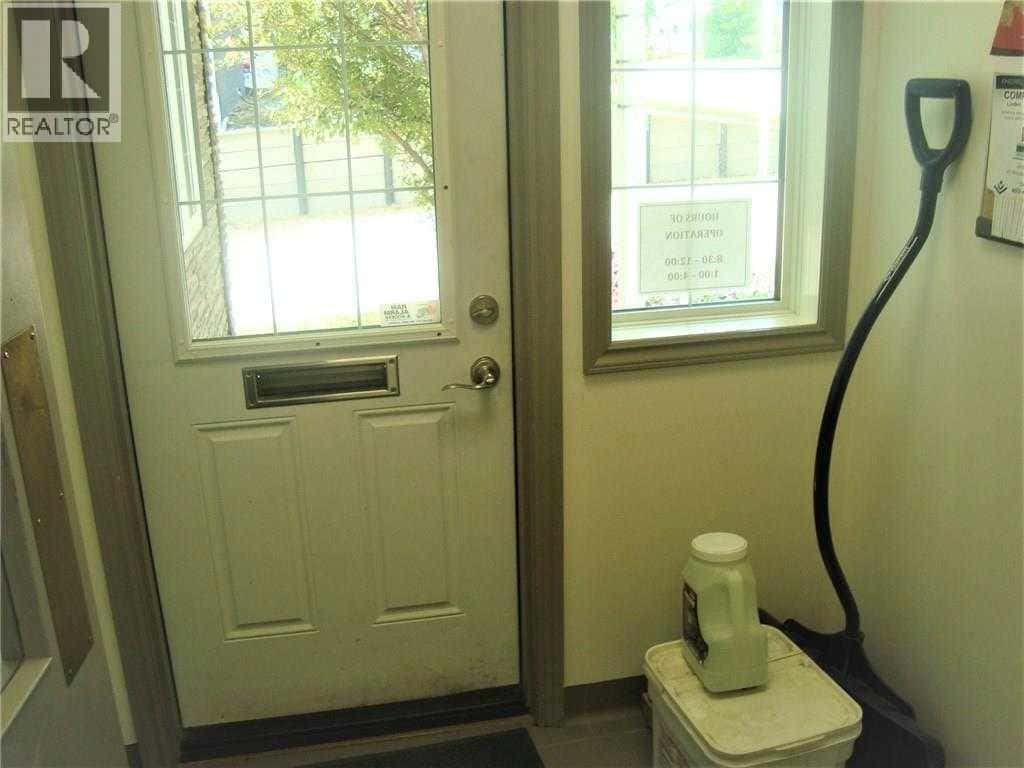 416 Arena Avenue — Trochu, Alberta - Photo 4 of 40