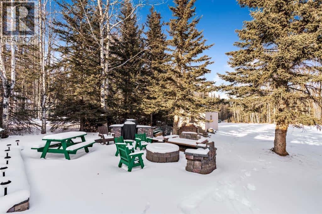 24 Mountain View Park — Bragg Creek, Alberta - Photo 2 of 35