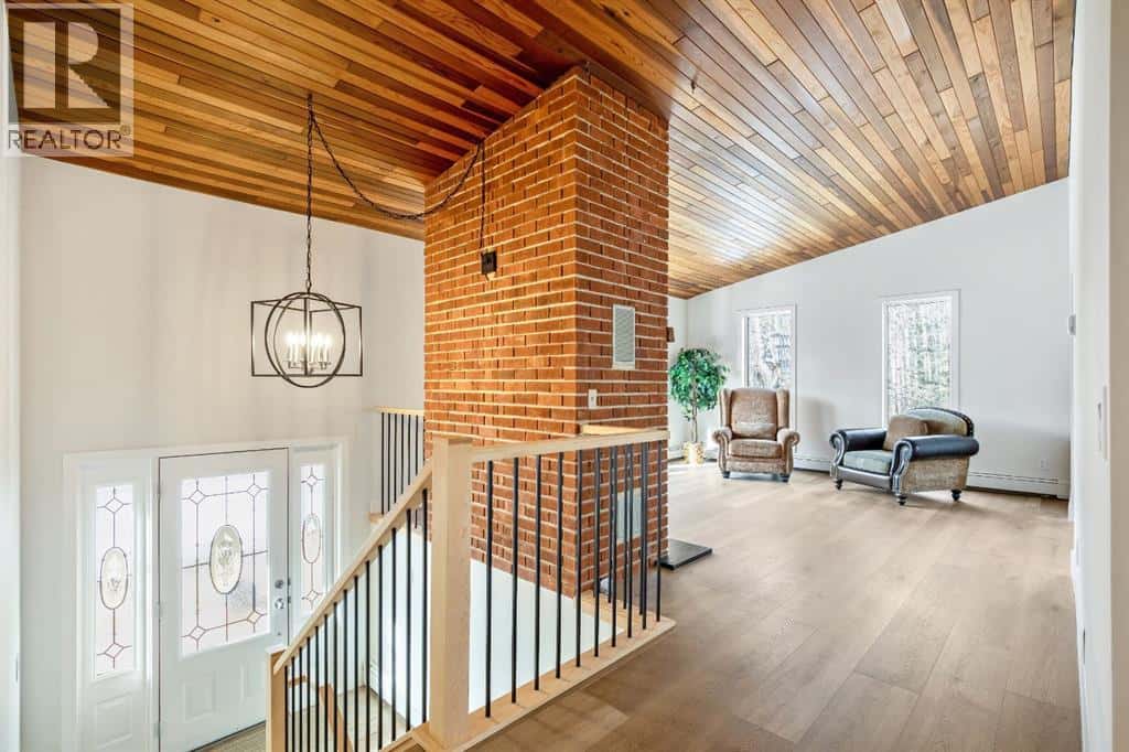 24 Mountain View Park — Bragg Creek, Alberta - Photo 5 of 35