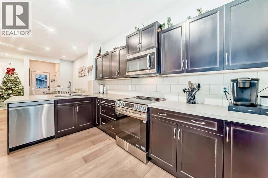 58 Reunion Grove NW — Airdrie, Alberta - Photo 5 of 26