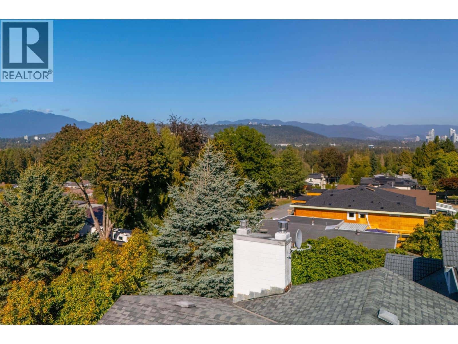 7740 ALLMAN STREET — Burnaby, British Columbia - Photo 2 of 40