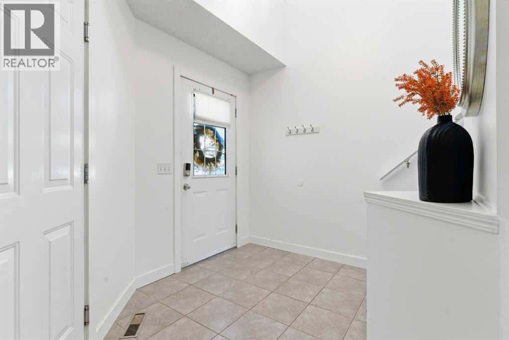 74 Evansbrooke Way NW — Calgary, Alberta - Photo 2 of 42