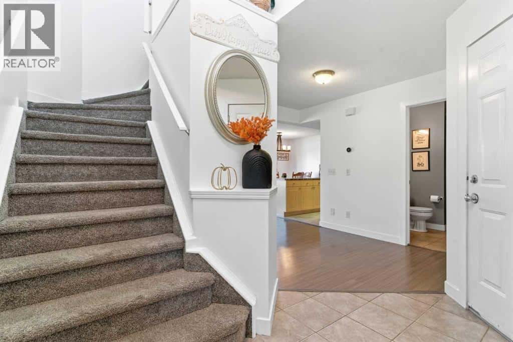 74 Evansbrooke Way NW — Calgary, Alberta - Photo 3 of 42