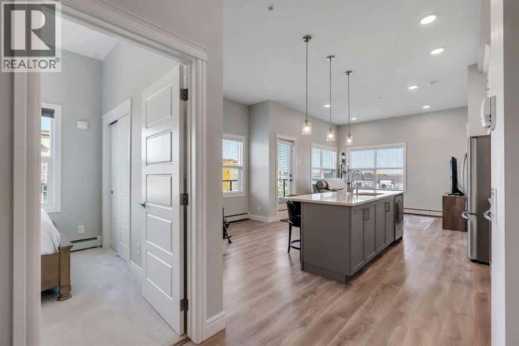 418, 19661 40 Street SE — Calgary, Alberta - Photo 4 of 29