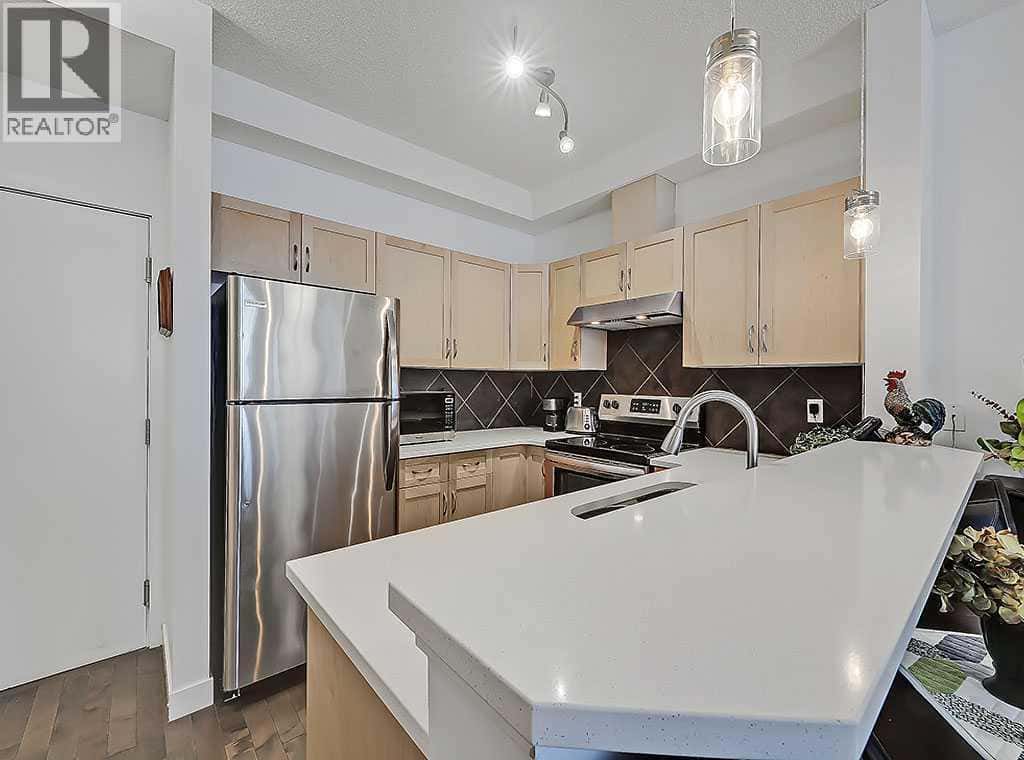 302, 540 5 Avenue NE — Calgary, Alberta - Photo 5 of 33