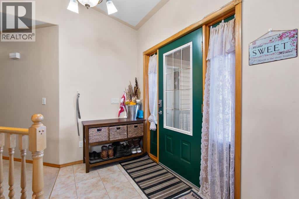 107 MONICA Bay — Carstairs, Alberta - Photo 3 of 42